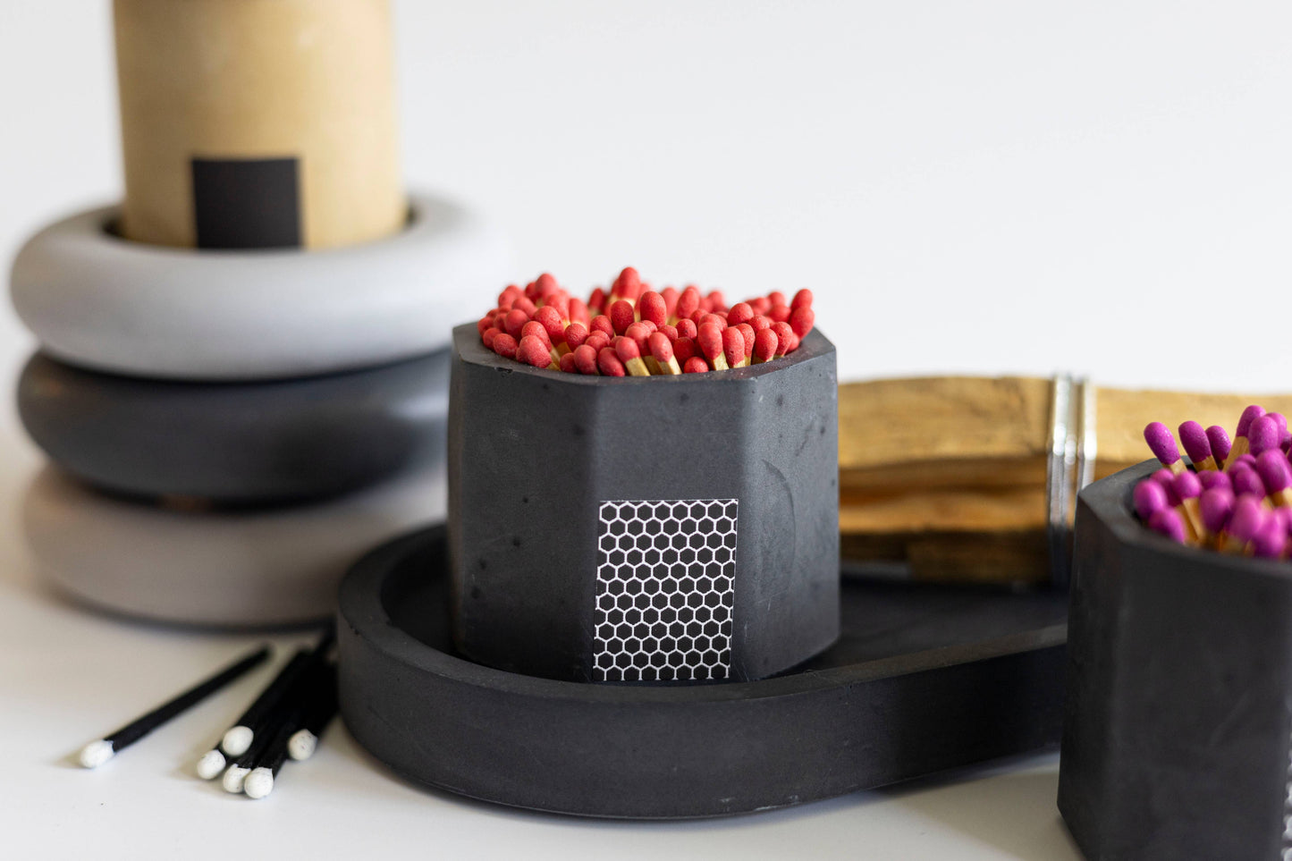 Black Match Holder with Red Matches