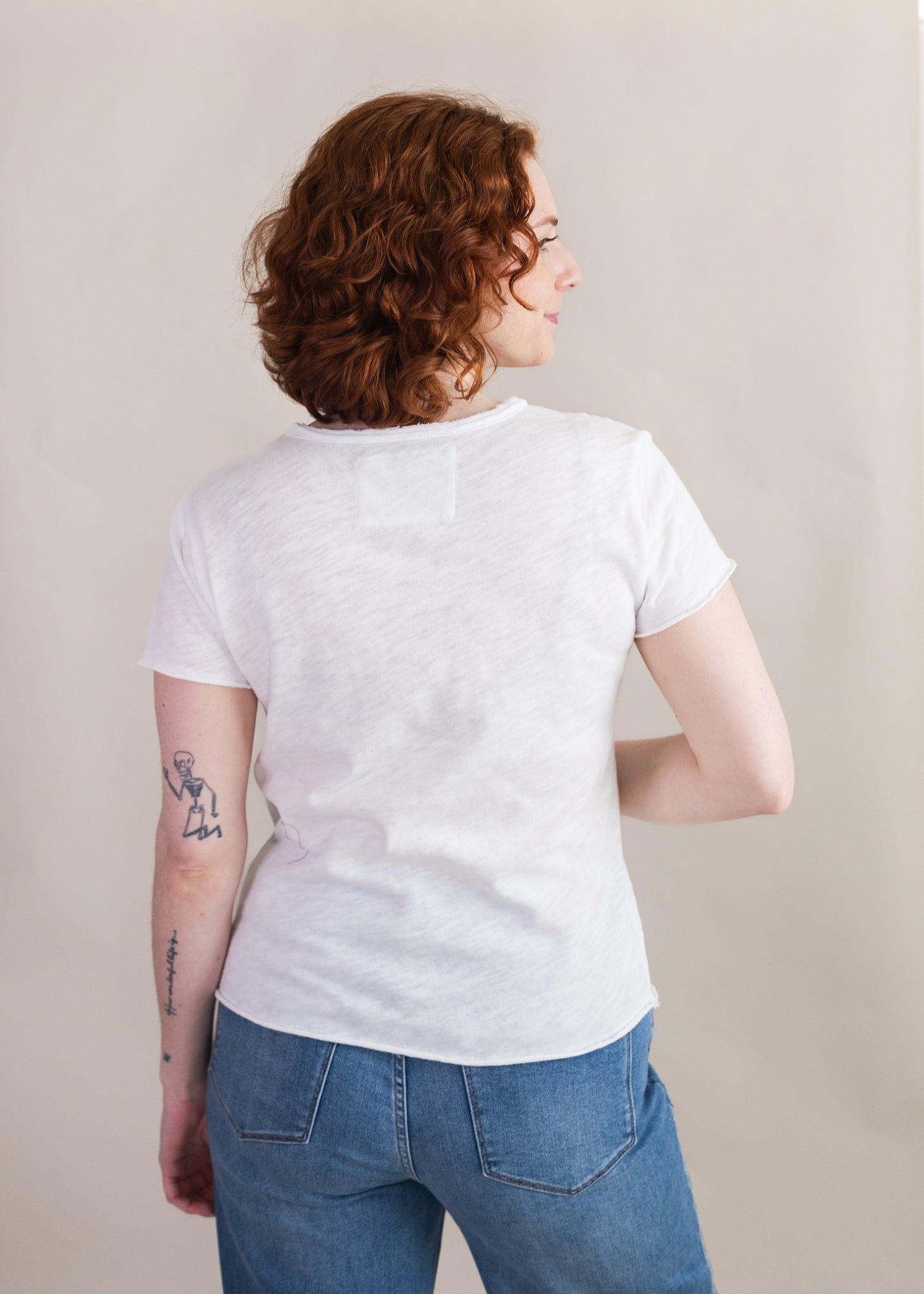 Vanya Relaxed V-Neck Tee in White | Dear John