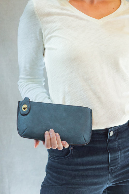 Mini Crossbody Wristlet Clutch in Washed Denim