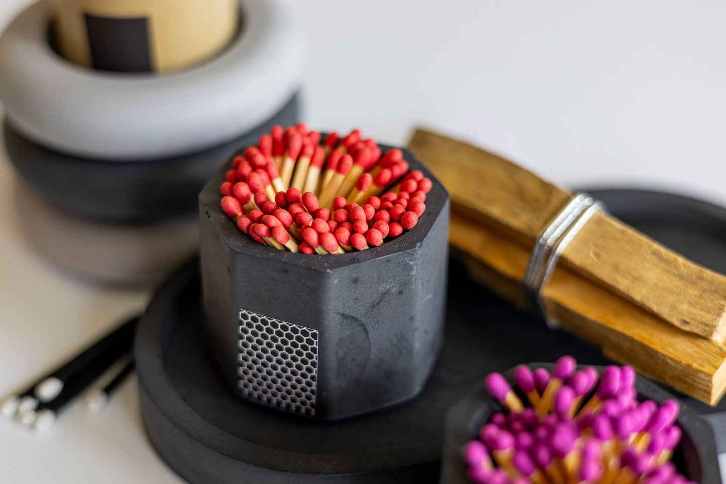 Black Match Holder with Red Matches