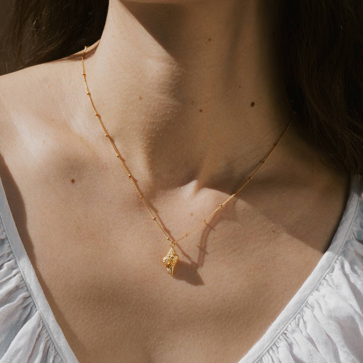 Gold Conch Shell Necklace