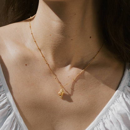 Gold Conch Shell Necklace