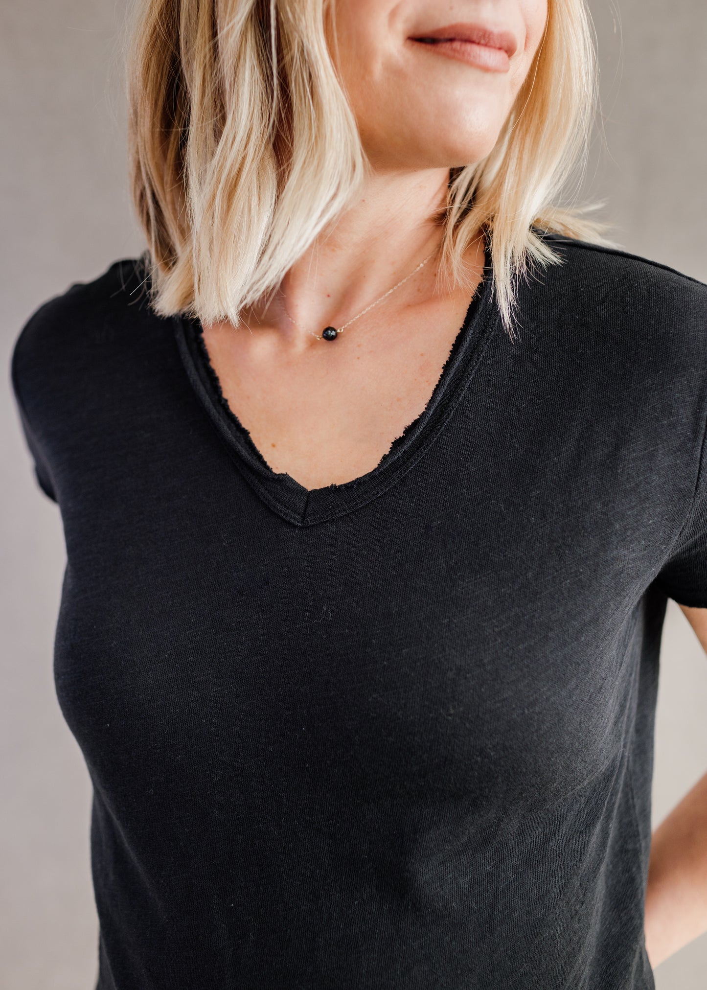 Vanya Relaxed V-Neck Tee in Black | Dear John