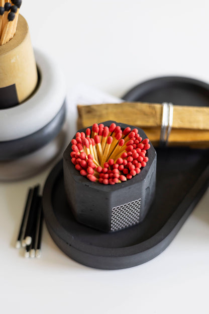 Black Match Holder with Red Matches