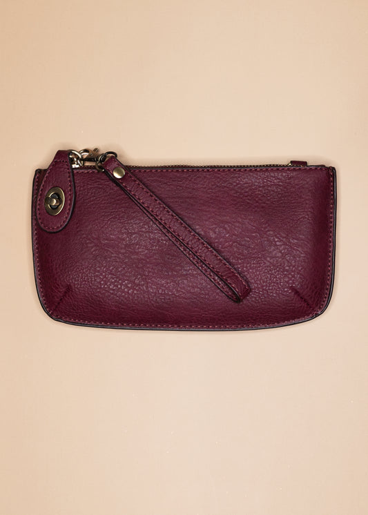 Mini Crossbody Wristlet Clutch in Red Violet