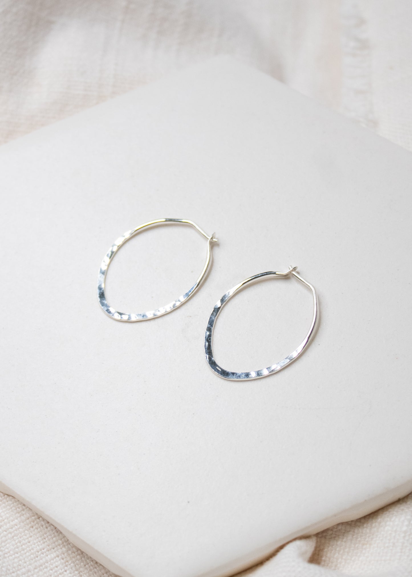 Oval Hammered Hoops: Sterling Silver / 30mm